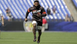 Cleveland Browns wide receiver Odell Beckham works out prior to an NFL football game against the Baltimore Ravens Sunday, Sept. 29, 2019, in Baltimore. (AP Photo/Julio Cortez)