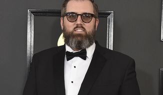 FILE - This Feb. 12, 2017 file photo shows songwriter and producer busbee at the 59th annual Grammy Awards in Los Angeles. Warner Records sent out a statement on Sunday saying busbee, whose real name was Michael James Ryan, died, but no cause of death or date was given. He was 43. (Photo by Jordan Strauss/Invision/AP, File)