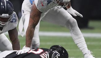 Atlanta Falcons quarterback Matt Ryan is face planted by Tennessee Titans outside linebacker Kamalei Correa during the second half in a NFL football game on Sunday, Sept. 29, 2019, in Atlanta. (Curtis Compton/Atlanta Journal-Constitution via AP)