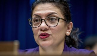 Rep. Rashida Tlaib, D-Mich., questions CDC Principal Deputy Secretary Dr. Anne Schuchat as she speaks before a House Oversight subcommittee hearing on lung disease and e-cigarettes on Capitol Hill in Washington, Tuesday, Sept. 24, 2019. (AP Photo/Andrew Harnik)