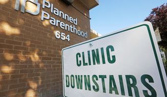 David Daleiden and Sandra Merritt, two pro-life activists, in 2015 posted online videos of Planned Parenthood workers and officials discussing fetal tissue sales, an outlawed practice. Planned Parenthood filed the federal lawsuit against them in 2016. (ASSOCIATED PRESS)