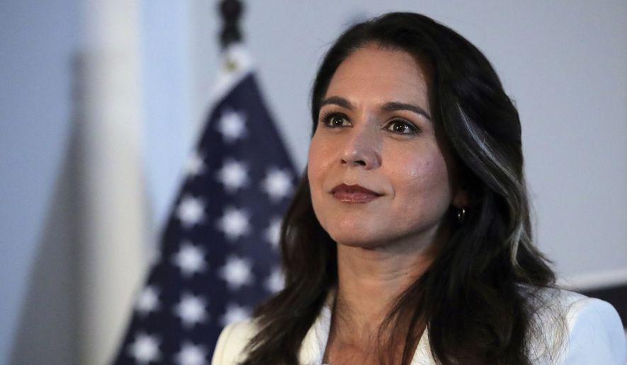 Democratic presidential candidate U.S. Rep. Tulsi Gabbard, D-Hawaii, listens to a question during a campaign stop in Londonderry, N.H., Tuesday, Oct. 1, 2019. (AP Photo/Charles Krupa) 