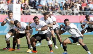 Fiji&#39;s players perform the Cibi ahead of their Rugby World Cup Pool D match against Uruguay in Kamaishi, northeastern Japan, Wednesday, Sept. 25, 2019. (Naoya Osato/Kyodo News via AP)