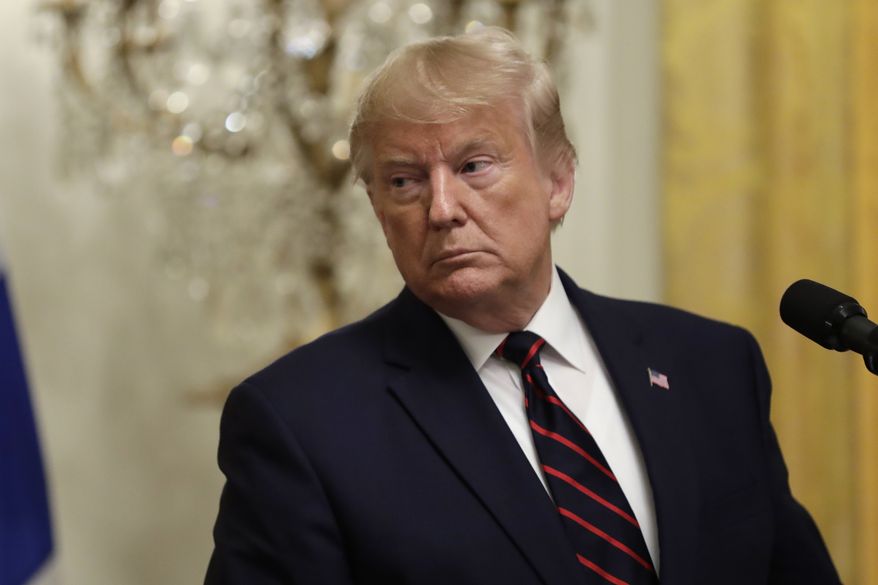 President Donald Trump listens to Finnish President Sauli Niinisto speak during a news conference in the East Room of the White House, Wednesday, Oct. 2, 2019, in Washington. (AP Photo/Evan Vucci)