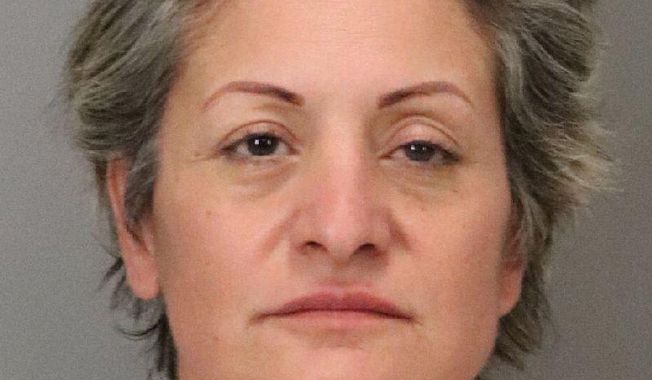In this Tuesday, Oct. 1, 2019 booking photo released by the Santa Clara County Sheriff's Office shows Mireya Orta, 50. Authorities in Northern California have arrested Orta on suspicion of murder after she allegedly ran down two pedestrians with her car in separate areas of a Cupertino, Calif., park, killing one. Santa Clara County Sheriff's Office spokesman Michael Low tells the Mercury News the woman was booked into jail in San Jose, Calif., Tuesday night. (Santa Clara County Sheriff's Office via AP)