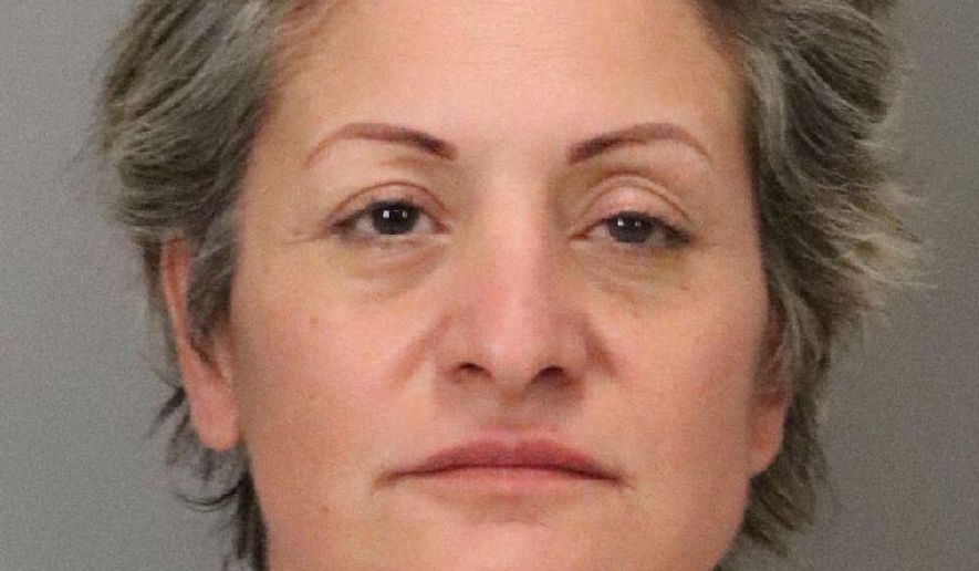 In this Tuesday, Oct. 1, 2019 booking photo released by the Santa Clara County Sheriff's Office shows Mireya Orta, 50. Authorities in Northern California have arrested Orta on suspicion of murder after she allegedly ran down two pedestrians with her car in separate areas of a Cupertino, Calif., park, killing one. Santa Clara County Sheriff's Office spokesman Michael Low tells the Mercury News the woman was booked into jail in San Jose, Calif., Tuesday night. (Santa Clara County Sheriff's Office via AP)