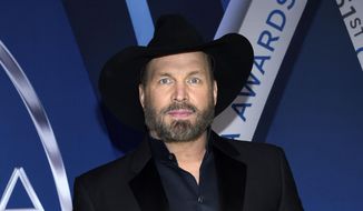 This Nov. 8, 2017 file photo shows Garth Brooks at the 51st annual CMA Awards in Nashville, Tenn. Brooks, whose hits include “Friends in Low Places,” and “The Thunder Rolls,” will receive the Library of Congress Gershwin Prize for Popular Song in March 2020. (Photo by Evan Agostini/Invision/AP, File) **FILE**