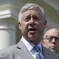 FILE - In this May 3, 2017, file photo, Rep. Fred Upton, R-Mich., left, speaks to reporters outside the White House in Washington. Upton, said he doesn&#39;t support a formal impeachment inquiry against President Donald Trump. But he has no problem with Democratic-led committees digging for more information. Upton told the Detroit Economic Club that &amp;quot;we need to know what the answers are.&amp;quot; He shared the stage Wednesday, Oct. 2, 2019 with Democratic Rep. Debbie Dingell. (AP Photo/Susan Walsh, File)