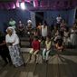Worshippers attend a prayer ceremony known as the &amp;quot;celebration of the word&amp;quot; led by Antelmo Pereira at the Catholic church in Santa Rosa, Brazil, Saturday, Sept. 21, 2019. In remote Amazonian communities that are only accessible by boat, villagers can go for months without sacraments that only priests are allowed to deliver - including Mass and confessions, and the faithful have to depend on missionaries such as Pereira that are only allowed to lead prayer ceremonies. (AP Photo/Fernando Vergara)