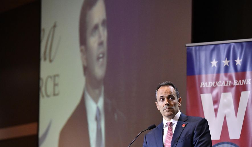 Kentucky Governor and Republican candidate for Governor Matt Bevin looks on as Attorney General and Democratic candidate Andy Beshear responds to a question during a debate in Paducah, Ky., Thursday, Oct. 3, 2019. (AP Photo/Timothy D. Easley)