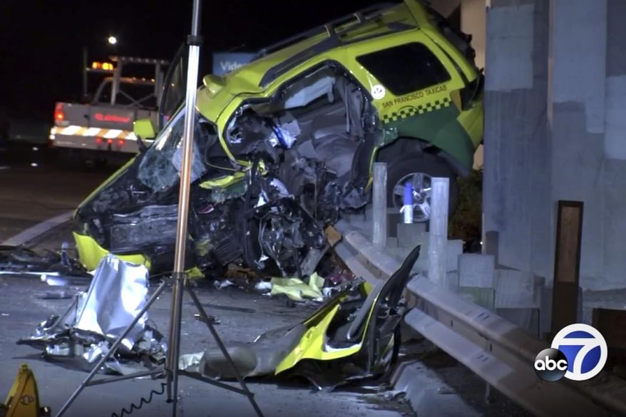 This Thursday, Aug. 1, 2019, photo taken from video provided by KGO-TV shows the scene of a car crash that authorities say killed four people on a highway in San Francisco. The California Highway Patrol says the collision happened Thursday about 12:30 a.m., just minutes after people started calling authorities to report a Volkswagen sedan driving south in the northbound lanes of Highway 101. (KGO-TV via AP)