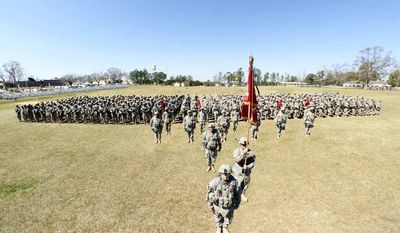 1st Battalion, 206th Field Artillery on parade before departing Camp Shelby in Mississippi on March 11, 2008 (MAJ Craig Heathscott, 39th BCT Public Affair Officer)