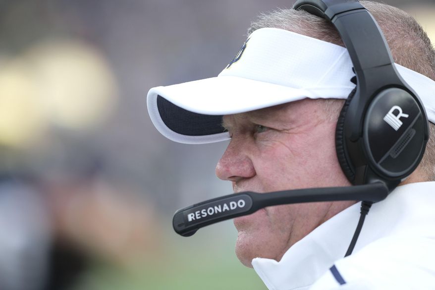 Notre Dame head coach Brian Kelly watchs from he sideline as his team played Virginia in the second half of an NCAA college football game in South Bend, Ind., Saturday, Sept. 28, 2019. Notre Dame won 35-20. (AP Photo/AJ Mast)