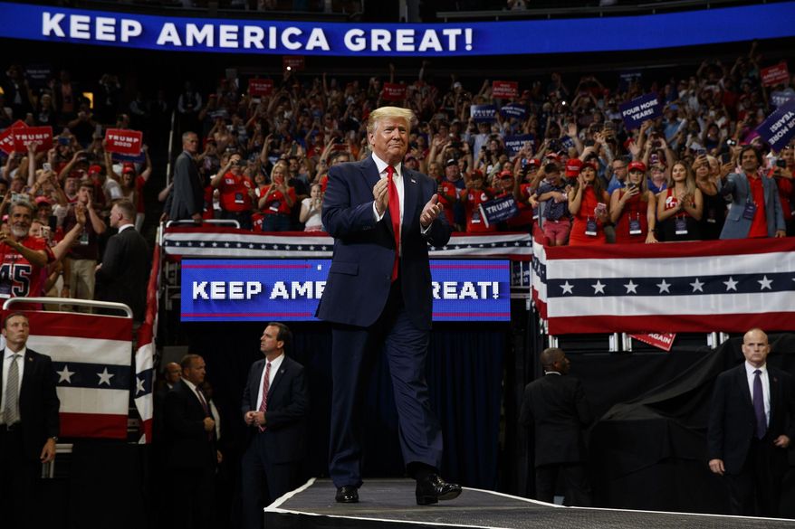 HOLD FOR STORY FILE - In this June 18, 2019, file photo, President Donald Trump arrives to speak at his re-election kickoff rally at the Amway Center, in Orlando, Fla. Trump will speak in Florida at a rally on Thursday, Oct. 3, 2019. (AP Photo/Evan Vucci, File)