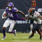 Minnesota Vikings wide receiver Stefon Diggs (14) runs with the ball as Chicago Bears strong safety Ha Ha Clinton-Dix (21) tugs on Diggs&#39; jersey during the second half of an NFL football game Sunday, Sept. 29, 2019, in Chicago. The Bears won 16-6. (AP Photo/Charles Rex Arbogast)
