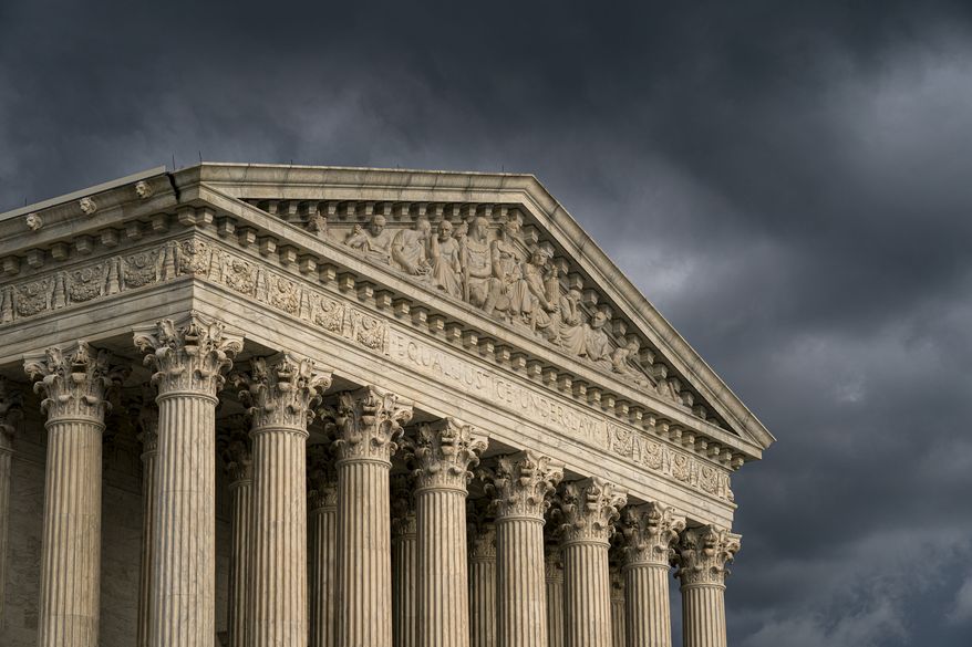 The Supreme Court is seen under stormy skies in Washington. The Supreme Court is adding an abortion case to its busy election-year docket. The justices have agreed to take up a Louisiana law that could leave the state with just one clinic. The justices wont hear arguments until the winter. A decision is likely to come by the end of June. (AP Photo/J. Scott Applewhite)