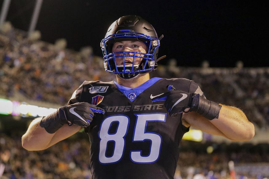 Boise State tight end John Bates celebrates after scoring a touchdown during the second half of the team's NCAA college football game against Air Force, Friday, Sept. 20, 2019, in Boise, Idaho. (AP Photo/Steve Conner) ** FILE **