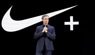 FILE - In this March 16, 2016, file photo Nike CEO Mark Parker speaks during a news conference in New York. Parker has found himself at the center of doping scandal that has brought down renown track coach Alberto Salazar, who ran an elite training program bankrolled by the world’s largest sports apparel company. (AP Photo/Mary Altaffer, File)