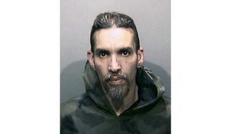 FILE - This Monday, June 5, 2017, file photo released by the Alameda County Sheriff&#x27;s Office shows Derick Almena at Santa Rita Jail in Alameda County, Calif. Almena who was in charge of an artists&#x27; work-live warehouse that burned three years ago, killing 36, is due back in court Friday, Oct. 4, 2019, for a possible retrial. Almena&#x27;s previous trial ended in a hung jury. (Alameda County Sheriff&#x27;s Office via AP, File)