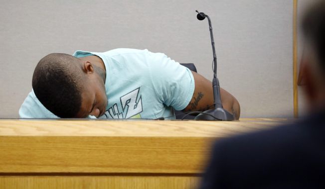 In this Tuesday, Sept. 24, 2019, file photo, Joshua Brown, a neighbor of victim Botham Jean, is overcome with emotion while giving testimony in court, in Dallas, after recounting how he&#x27;d heard Jean singing gospel and Drake songs across the hall before he was fatally shot. Authorities say that Brown was killed in a shooting Friday, Oct. 4. (Tom Fox/The Dallas Morning News via AP, Pool, File)