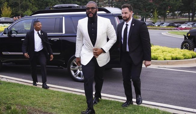 Tyler Perry arrives at the grand opening of Tyler Perry Studios on Saturday, Oct. 5, 2019, in Atlanta. (Photo by Elijah Nouvelage/Invision/AP)
