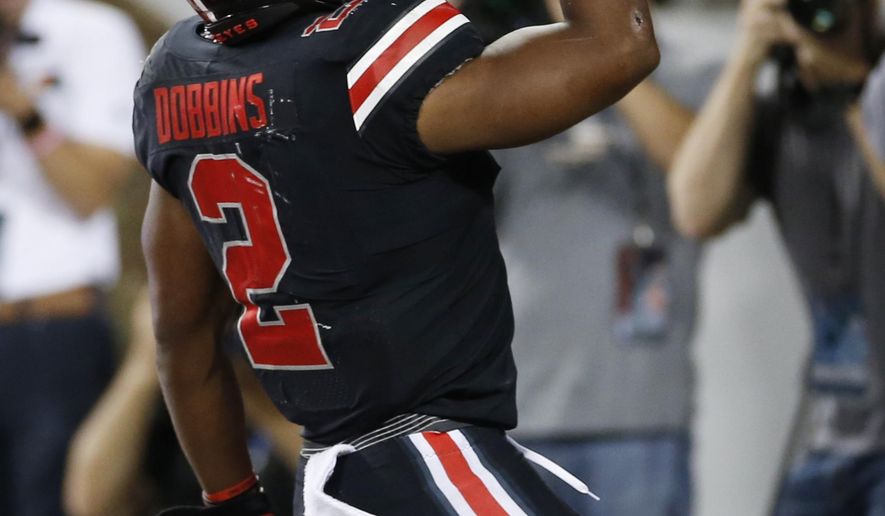 Ohio State running back J.K. Dobbins celebrates his touchdown against Michigan State during the first half of an NCAA college football game Saturday, Oct. 5, 2019, in Columbus, Ohio. (AP Photo/Jay LaPrete)
