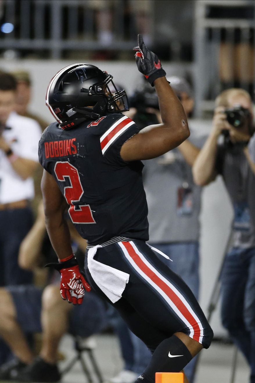 Ohio State running back J.K. Dobbins celebrates his touchdown against Michigan State during the first half of an NCAA college football game Saturday, Oct. 5, 2019, in Columbus, Ohio. (AP Photo/Jay LaPrete)
