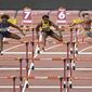 Luca Kozak, of Hungary, Nia Ali, of the United States, left, Danielle Williams, of Jamaica, Nadine Visser, of the Netherlands, and Cindy Roleder, of Germany, from left, compete in the women&#39;s 100 meter hurdles semifinal at the World Athletics Championships in Doha, Qatar, Sunday, Oct. 6, 2019. (AP Photo/Martin Meissner)