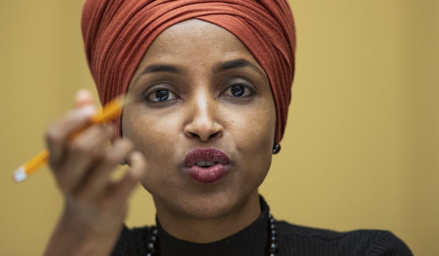 FILE - in this Sept. 24, 2019 file photo, Rep. Ilhan Omar, D-Minn., speaks on Capitol Hill in Washington. Rep. Omar has filed for divorce from her husband. The freshman Democrat cited an &quot;irretrievable breakdown&quot; of her marriage with Ahmed Hirsi in her filing Friday, Oct. 4, 2019, in Hennepin County District Court. (AP Photo/Manuel Balce Ceneta File)