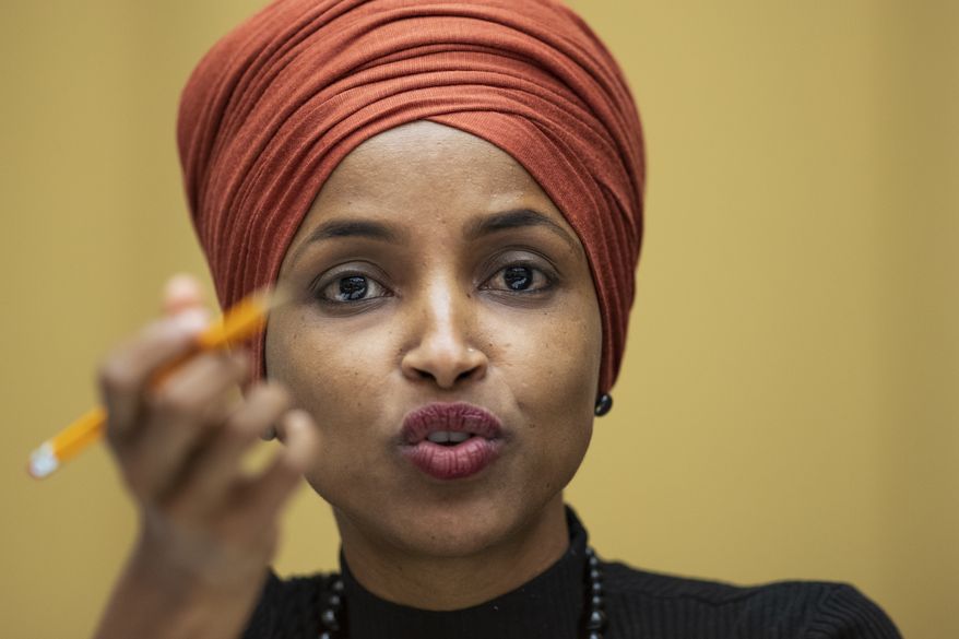 FILE - in this Sept. 24, 2019 file photo, Rep. Ilhan Omar, D-Minn., speaks on Capitol Hill in Washington. Rep. Omar has filed for divorce from her husband. The freshman Democrat cited an &quot;irretrievable breakdown&quot; of her marriage with Ahmed Hirsi in her filing Friday, Oct. 4, 2019, in Hennepin County District Court. (AP Photo/Manuel Balce Ceneta File)