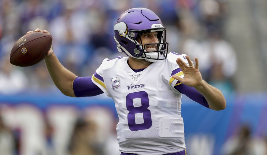 Minnesota Vikings quarterback Kirk Cousins (8) passes against the New York Giants during the first quarter of an NFL football game, Sunday, Oct. 6, 2019, in East Rutherford, N.J. (AP Photo/Adam Hunger) ** FILE **