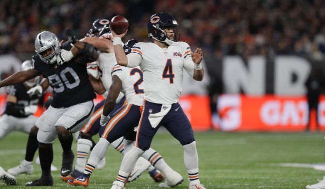 Chicago Bears quarterback Chase Daniel (4) prepares to throw during the second half of an NFL football game against the Oakland Raiders at Tottenham Hotspur Stadium, Sunday, Oct. 6, 2019, in London. (AP Photo/Kirsty Wigglesworth)