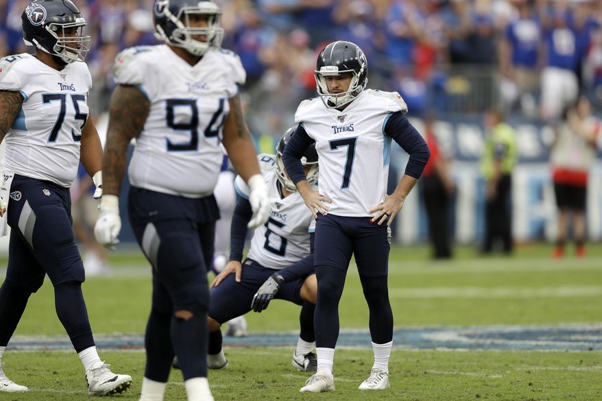 Tennessee Titans kicker Cairo Santos (7) stands on the field after missing his fourth straight field goal attempt against the Buffalo Bills in the second half of an NFL football game Sunday, Oct. 6, 2019, in Nashville, Tenn. (AP Photo/James Kenney)