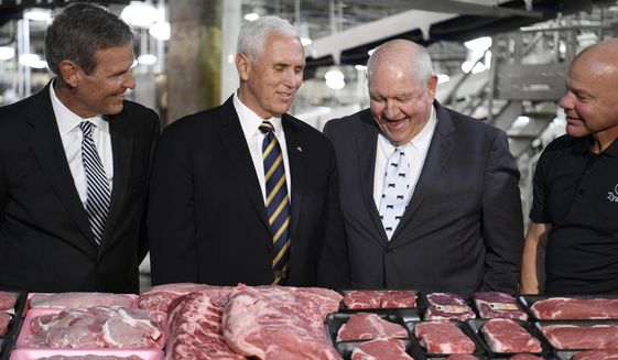 Tennessee Gov. Bill Lee, U.S. Vice President Mike Pence, Secretary of Agriculture Sonny Perdue and Tyson Foods plant manager Doug Griffin stand together during the vice president&#x27;s visit to Tyson Foods Monday, Oct. 7, 2019 in Goodlettsville, Tenn.  (George Walker IV/The Tennessean via AP)  **FILE**