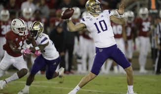 Washington&#x27;s Jacob Eason passes against Stanford in the second half of an NCAA college football game Saturday, Oct. 5, 2019, in Stanford, Calif. (AP Photo/Ben Margot)