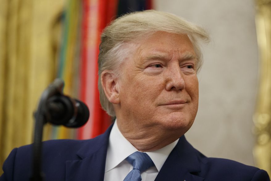 President Donald Trump pauses before speaking during a ceremony to present the Presidential Medal of Freedom to former Attorney General Edwin Meese, in the Oval Office of the White House, Tuesday, Oct. 8, 2019, in Washington. (AP Photo/Alex Brandon)