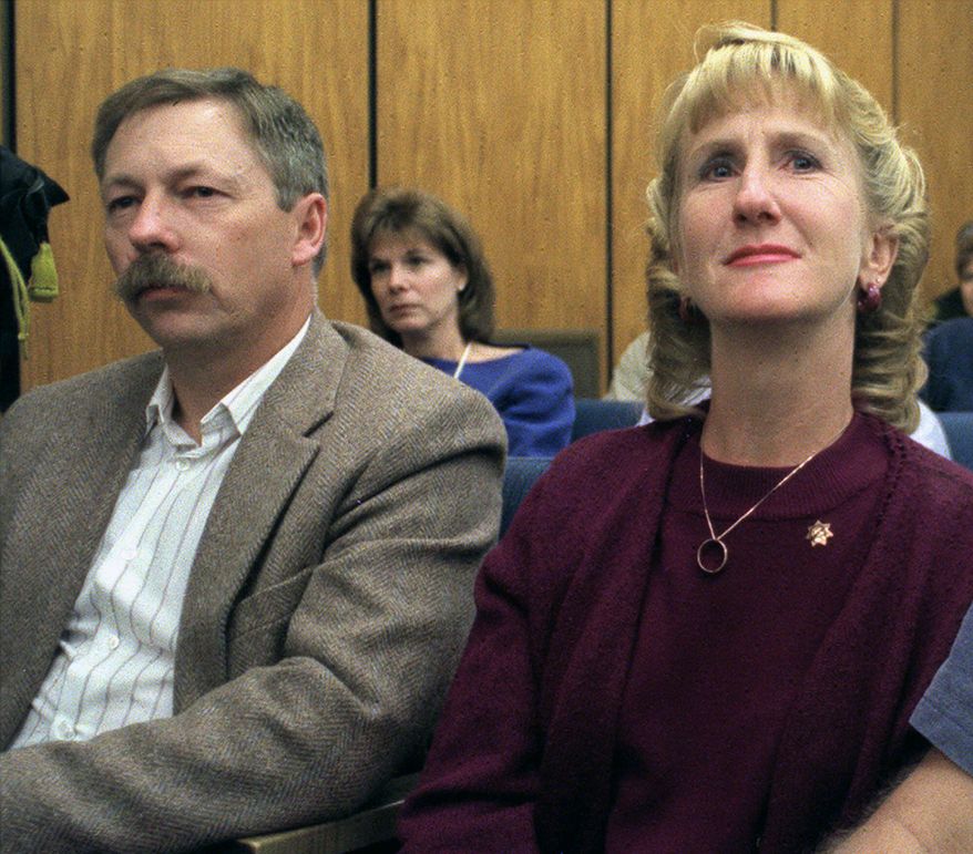 FILE - In this Sept, 27, 1999, file photo, Carolyn Sullivan, widow of slain University of Nevada, Reno Police Sgt. George Sullivan, reacts as the guilty verdict is read against her husband's killer, Siaosi Vanisi, in Reno, Nev. With her is family friend Kelly Dean. The American Bar Association has joined an appeal challenging the death sentence of Vanisi, it says was mentally ill when he was convicted of the 1998 hatchet slaying of Sullivan. The national group of lawyers and professional legal scholars is asking the Nevada Supreme Court to block Vanisi's execution. (Marilyn Newton/The Reno Gazette-Journal via AP, Pool, File)