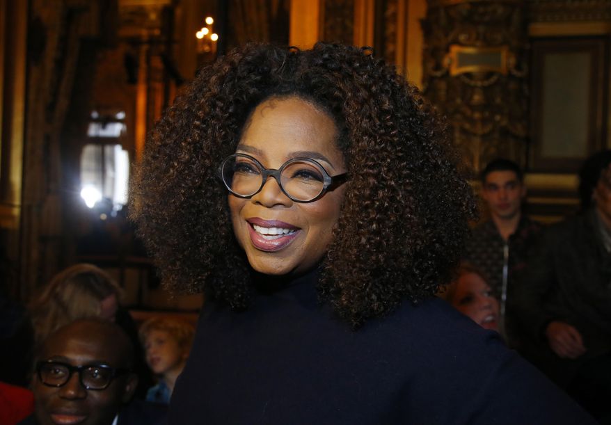 FILE - This March 4, 2019 file photo shows Oprah Winfrey at the presentation of Stella McCartney&#x27;s ready-to-wear Fall-Winter 2019-2020 fashion collection in Paris. Winfrey says she’s giving $13 million to increase a scholarship endowment at Morehouse College in Atlanta, a historically black college. (AP Photo/Michel Euler, File)