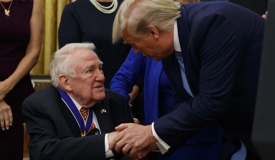 President Donald Trump shakes hands with former Attorney General Edwin Meese after a ceremony to present the Presidential Medal of Freedom to Meese, in the Oval Office of the White House, Tuesday, Oct. 8, 2019, in Washington. (AP Photo/Alex Brandon)