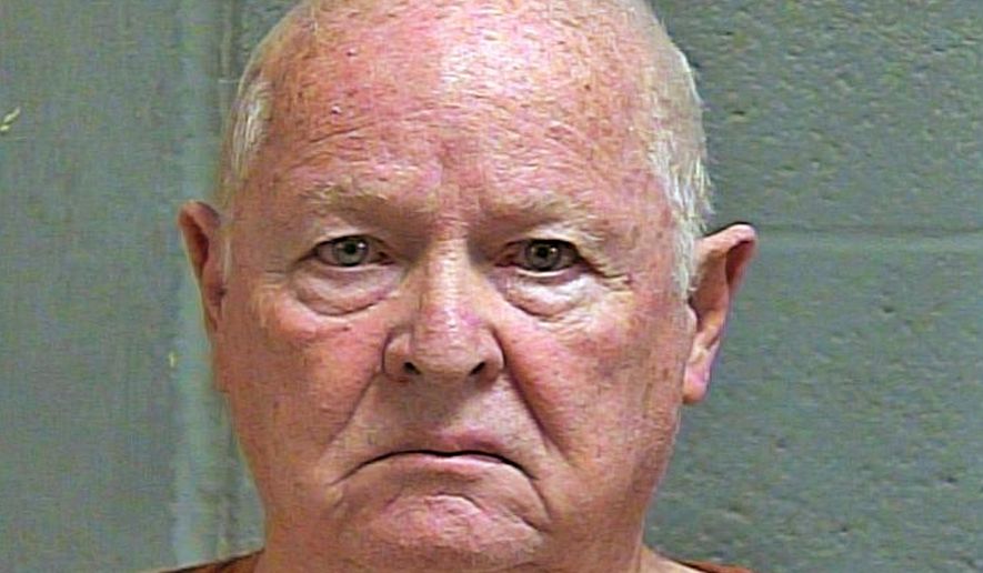 In this photo provided by the Oklahoma County Sheriff's Office, Royce Davis is pictured in a booking photo dated Oct. 7, 2019. Davis, an 80-year-old man, has been arrested on a murder complaint in the fatal shooting of his 77-year-old wife. (Oklahoma County Sheriff's Office via AP)