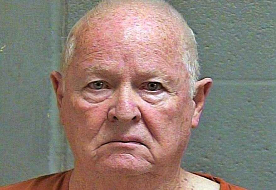 In this photo provided by the Oklahoma County Sheriff's Office, Royce Davis is pictured in a booking photo dated Oct. 7, 2019. Davis, an 80-year-old man, has been arrested on a murder complaint in the fatal shooting of his 77-year-old wife. (Oklahoma County Sheriff's Office via AP)