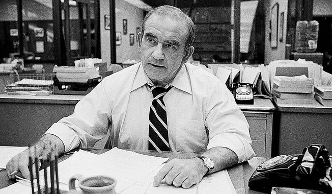 **  FILE  ** Ed Asner is shown in character as he portrays the city editor of the Los Angeles Tribune behind his office desk on the television drama &quot;Lou Grant&quot; in Los Angeles, Ca., in this Jan. 13, 1978 file photo. When everyone but idiotic anchorman Ted Baxter was fired from WJM News in 1977, Mary Richards and her fellow casualties were left reeling. It was a classically bittersweet finale for the beloved &quot;Mary Tyler Moore&quot; show after seven hit seasons. Then Mary&#x27;s crusty boss, station news director Lou Grant, made a smooth transition. Within weeks, he had blown Minneapolis and snagged a good job in Los Angeles as city editor of The Tribune. (AP Photo/File)
