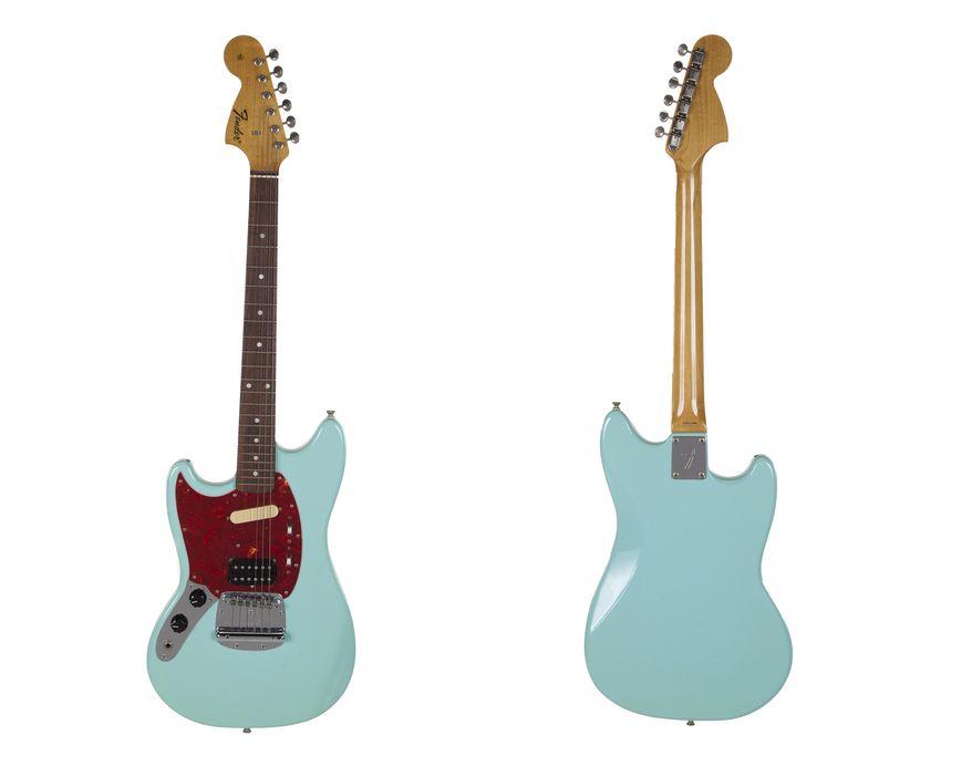This combination photo of images released by Julien's Auctions shows the front and back of a turquoise-bodied left-handed Fender guitar built in 1993 and used by Nirvana frontman Kurt Cobain during the band’s In Utero tour. The item is one of many rock and roll items up for auction on Oct. 25 and 26. (Julien's Auctions via AP)