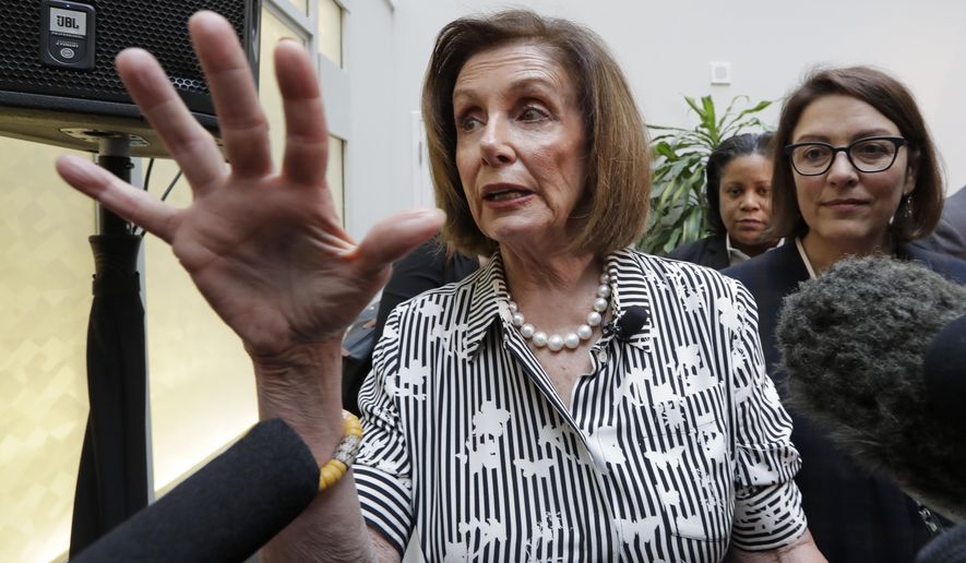 Speaker of the House Nancy Pelosi, D-Calif., left, speaks with media members with Rep. Suzan DelBene, D-Wash., after they spoke about lowering the cost of prescription drug prices Tuesday, Oct. 8, 2019, at Harborview Medical Center in Seattle. (AP Photo/Elaine Thompson)