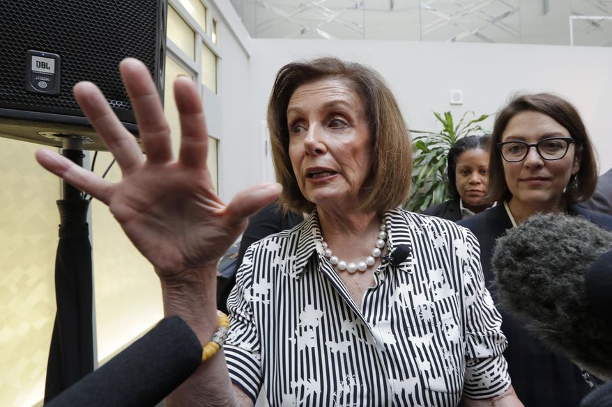 Speaker of the House Nancy Pelosi, D-Calif., left, speaks with media members with Rep. Suzan DelBene, D-Wash., after they spoke about lowering the cost of prescription drug prices Tuesday, Oct. 8, 2019, at Harborview Medical Center in Seattle. (AP Photo/Elaine Thompson)