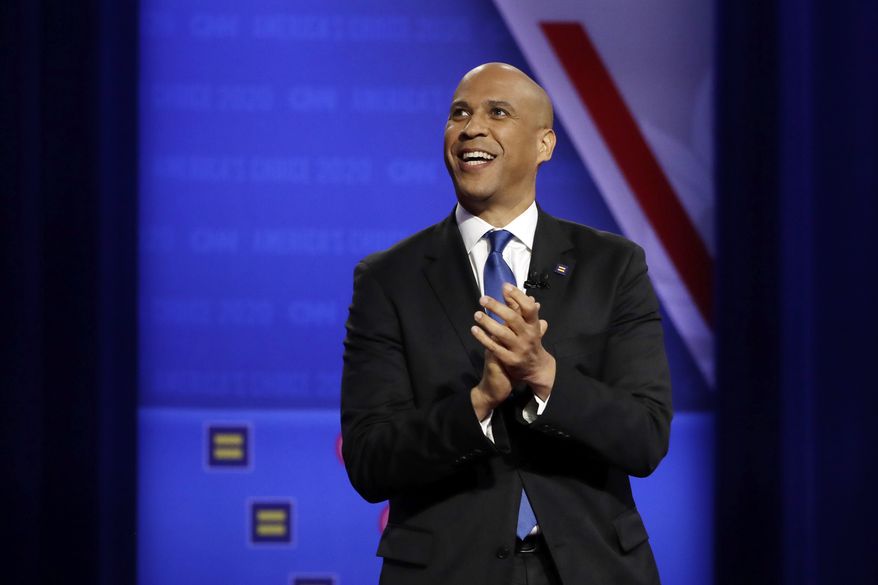 Democratic presidential candidate Sen. Cory Booker, D-N.J., speaks during the Power of our Pride Town Hall Thursday, Oct. 10, 2019, in Los Angeles. The LGBTQ-focused town hall featured nine 2020 Democratic presidential candidates. (AP Photo/Marcio Jose Sanchez)