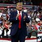 President Donald Trump arrives to speak at a campaign rally at the Target Center, Thursday, Oct. 10, 2019, in Minneapolis. (AP Photo/Evan Vucci)