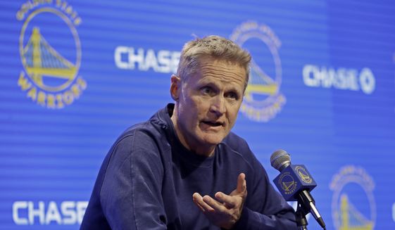 Golden State Warriors coach Steve Kerr gestures while speaking to reporters before the team&#39;s NBA basketball game against the Minnesota Timberwolves on Thursday, Oct. 10, 2019, in San Francisco. (AP Photo/Ben Margot)