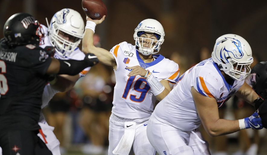 Boise State quarterback Hank Bachmeier throws a pass against UNLV during the second half of an NCAA college football game Saturday, Oct. 5, 2019, in Las Vegas. (AP Photo/John Locher)