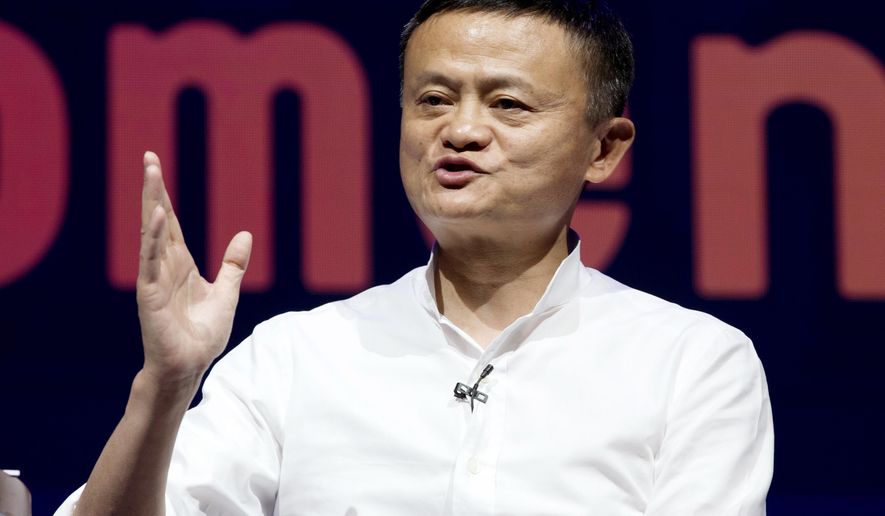 FILE - In this Oct. 12, 2018, file photo, Chairman of Alibaba Group Jack Ma speaks during a seminar in Bali, Indonesia. An annual survey of China’s wealthiest businesspeople found they got richer this year despite a tariff war with Washington and slowing economic growth. The Hurun Report said the net worth of China’s richest 1,800 people rose 10% over 2018 to $1.4 billion. Ma, who retired last month as chairman of e-commerce giant Alibaba, was No. 1 with a fortune of $39 billion. (AP Photo/Firdia Lisnawati, File)